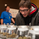 Image via Getty; A man at the Denver Discrete Dispensary on January 1, 2014, when sales of recreational marijuana were officially legal in Denver